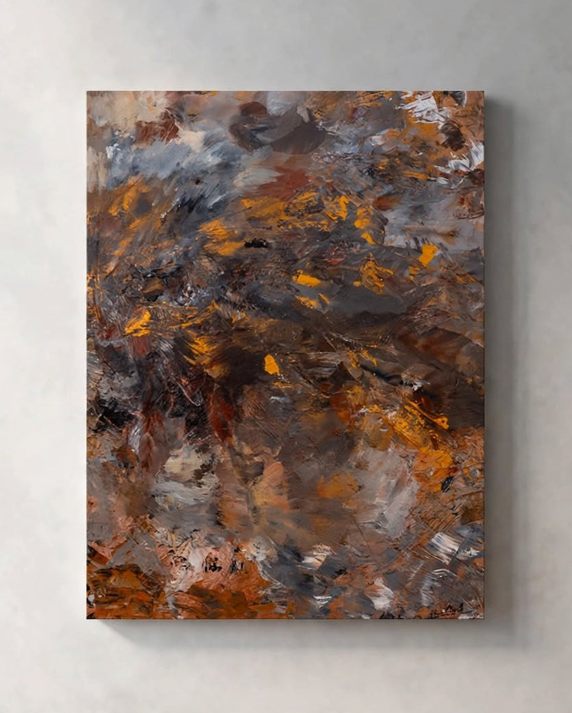 An abstract canvas wall art print featuring textured brushstrokes of brown, gold, gray, and white, displayed on a light gray textured wall.